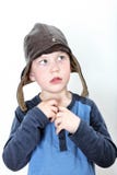 Small Boy Wearing Historic Leather Motorcycle Hood Looking To Top Left Stock Photography
