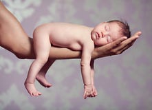 Small child sleeps on the hands of parents stock images Small child sleeps on the hands of parents stock images