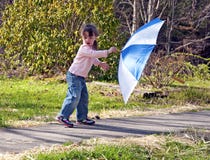 https://thumbs.dreamstime.com/t/small-girl-playing-umbrella-windy-day-24525146.jpg