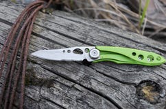 Small and light knife for everyday carrying in the city. EDC knife. stock photos Small and light knife for everyday carrying in the city. EDC knife. stock photos