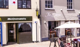 Small reataurant in vintage british building at the center of old town. Royalty Free Stock Photography Small reataurant in vintage british building at the center of old town. Royalty Free Stock Photography