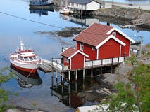Small Red House With Boat In Moskenes, Lofoten Royalty Free Stock Photography