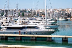 Small sailing boats and yachts docked at port of Piraeus, Greece stock photography Small sailing boats and yachts docked at port of Piraeus, Greece stock photography