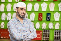 Small shop owner indian man at his souvenir store royalty free stock photography Small shop owner indian man at his souvenir store royalty free stock photography