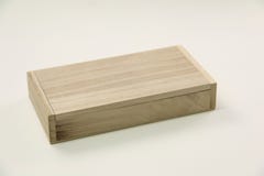 Small Wooden Box On White. . Stock Photo