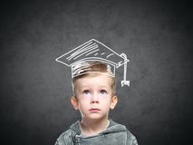 Smart child in a drawn student hat royalty free stock photos Smart child in a drawn student hat royalty free stock photos
