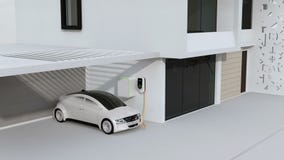 Smart home powered by solar panels and wind turbine. Electric vehicle recharging in garage
