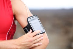 Smart Phone Running Music Closeup - Male Runner Royalty Free Stock Images Smart Phone Running Music Closeup - Male Runner Royalty Free Stock Images