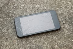 Smart Phone With A Broken Screen Stock Photography