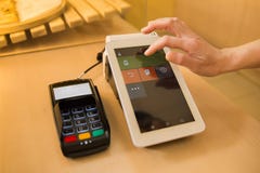 Smart terminal in operation. Online ticket office with a terminal. electronic cash register. checkout. royalty free stock image Smart terminal in operation. Online ticket office with a terminal. electronic cash register. checkout. royalty free stock image