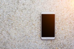 Smartphone on stone table. royalty free stock image Smartphone on stone table. royalty free stock image