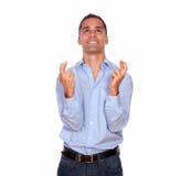 Smiling adult man crossing his fingers looking up royalty free stock photos Smiling adult man crossing his fingers looking up royalty free stock photos