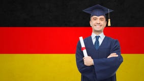 Smiling adult student in mortarboard with diploma stock photography Smiling adult student in mortarboard with diploma stock photography