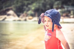 Smiling beautiful baby child kid leisure activity fun beach sea during hot summer holidays Royalty Free Stock Photography Smiling beautiful baby child kid leisure activity fun beach sea during hot summer holidays Royalty Free Stock Photography