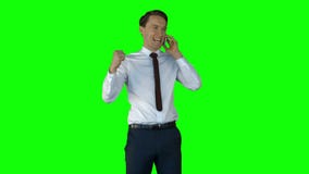 Smiling businessman having phone call on green screen stock video Smiling businessman having phone call on green screen stock video
