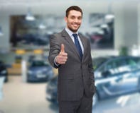 Smiling businessman showing thumbs up royalty free stock photo Smiling businessman showing thumbs up royalty free stock photo