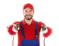 Smiling car mechanic with jumper cables isolated on white royalty free stock images Smiling car mechanic with jumper cables isolated on white royalty free stock images
