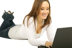 Smiling Caucasian Girl Using Laptop Royalty Free Stock Photography Smiling Caucasian Girl Using Laptop Royalty Free Stock Photography