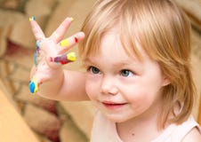 Smiling Child With The Color Hand Stock Images
