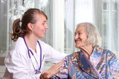 Smiling Doctor Takes Care The Senior Royalty Free Stock Image Smiling Doctor Takes Care The Senior Royalty Free Stock Image