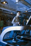 Asian men in the gym to ride a bicycle. Stock Photos Asian men in the gym to ride a bicycle. Stock Photos