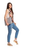 Smiling girl, with laptop full height stock photos Smiling girl, with laptop full height stock photos