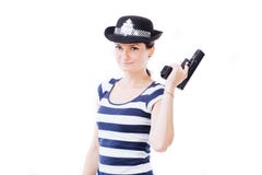 Smiling girl posing as policewoman stock images Smiling girl posing as policewoman stock images
