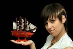 Smiling Girl With The Toy Ship Stock Image