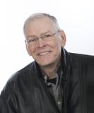 Smiling, gray haired, retiree in glasses royalty free stock images Smiling, gray haired, retiree in glasses royalty free stock images