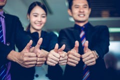 Smiling happy Businessman and Businesswomen celebrating success Achievement Arm Raised and show thumb up Concept royalty free stock photo Smiling happy Businessman and Businesswomen celebrating success Achievement Arm Raised and show thumb up Concept royalty free stock photo