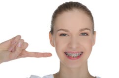 Smiling Happy Girl Indicates Braces On Teeth Stock Image Smiling Happy Girl Indicates Braces On Teeth Stock Image