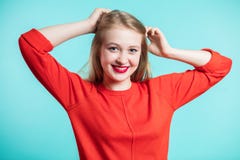 https://thumbs.dreamstime.com/t/smiling-happy-woman-blue-background-redheaded-girl-red-dress-red-lips-positive-emotions-youth-concept-smiling-114475822.jpg