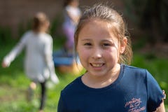 Smiling Little Girl in Back Yard royalty free stock photos Smiling Little Girl in Back Yard royalty free stock photos