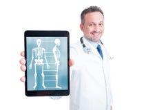 Smiling medic showing tablet pc computer screen stock photography Smiling medic showing tablet pc computer screen stock photography