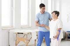 Disabled senior woman during rehabilitation stock images Disabled senior woman during rehabilitation stock images
