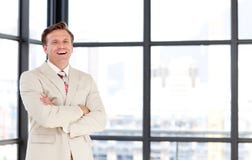 Smiling senior businessman with folded arms royalty free stock photography Smiling senior businessman with folded arms royalty free stock photography