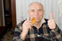 Smiling Senior Man Giving A Thumbs Up Royalty Free Stock Photo