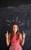 Smiling teenage girl showing the concept of thinking stock image Smiling teenage girl showing the concept of thinking stock image