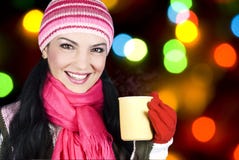 Smiling Winter Woman Holding Hot Tea Royalty Free Stock Images Smiling Winter Woman Holding Hot Tea Royalty Free Stock Images