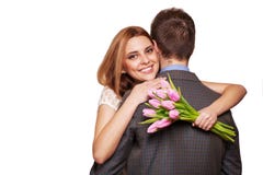 https://thumbs.dreamstime.com/t/smiling-woman-hugging-her-husband-women-men-holding-bouquet-tulips-concept-valentine-s-day-37663285.jpg