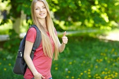 Smiling woman student with backpack royalty free stock photography Smiling woman student with backpack royalty free stock photography