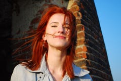 Smiling Woman With Red Hair Stock Photos