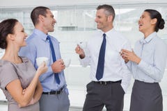 Smiling work team during break time royalty free stock image Smiling work team during break time royalty free stock image
