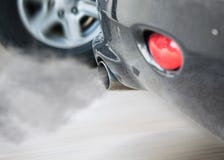 Smoke car pipe exhaust,Smoke from a car producing pollution stock images Smoke car pipe exhaust,Smoke from a car producing pollution stock images
