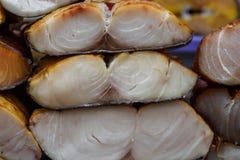 Smoked tuna fish steaks, prepared seafood close up stock images Smoked tuna fish steaks, prepared seafood close up stock images