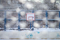 Snow on basketballshoes Playground in winter stock images Snow on basketballshoes Playground in winter stock images