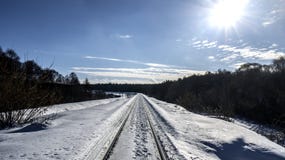 The snow-covered railway is lit by the sun. royalty free stock images The snow-covered railway is lit by the sun. royalty free stock images
