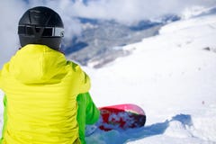 Snowboarder sitting
