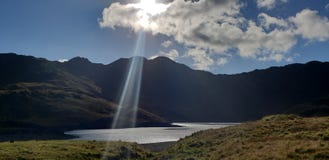 Snowdon Snowdonia ray of light sun beam scenic rural stunning royalty free stock photos Snowdon Snowdonia ray of light sun beam scenic rural stunning royalty free stock photos