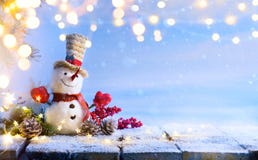 Snowman and Christmas tree decoration; background or season holidays banner